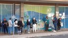 Trabalho da CGE itinerante entrevistando pessoas.