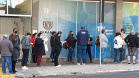 Trabalho da CGE itinerante entrevistando pessoas.