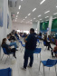 Trabalho da CGE itinerante entrevistando pessoas.