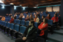 auditório com agentes de compliance