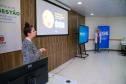 fotos do curso de integração em que aparecem os novos servidores e apresentações feitas por coordenadores e chefes de núcleos.