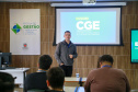 fotos do curso de integração em que aparecem os novos servidores e apresentações feitas por coordenadores e chefes de núcleos.