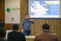 fotos do curso de integração em que aparecem os novos servidores e apresentações feitas por coordenadores e chefes de núcleos.