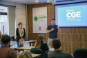 fotos do curso de integração em que aparecem os novos servidores e apresentações feitas por coordenadores e chefes de núcleos.