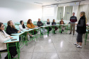 agentes das universidades assistem às palestras no encontro.