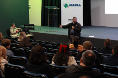 auditório com agentes de compliance